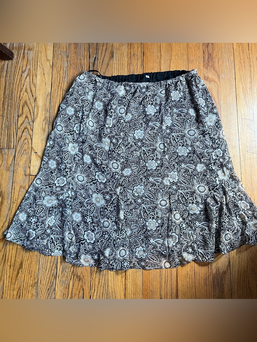 Tan and black floral ruffle midi skirt